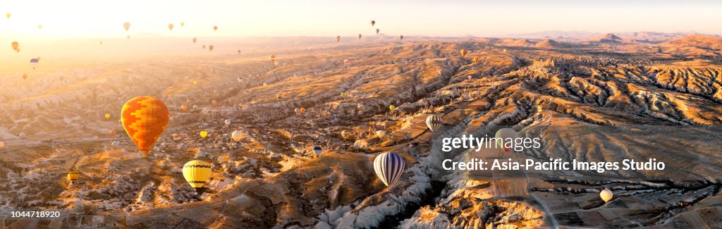 Aerial view of hot air balloons over Cappadocia at sunrise，Turkey(Panorama XXL)