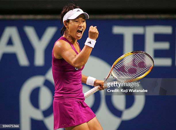 Kimiko Date Krumm of Japan celebrates after defeating Maria Sharapova of Russia during on day two of the Toray Pan Pacific Open at Ariake Colosseum...