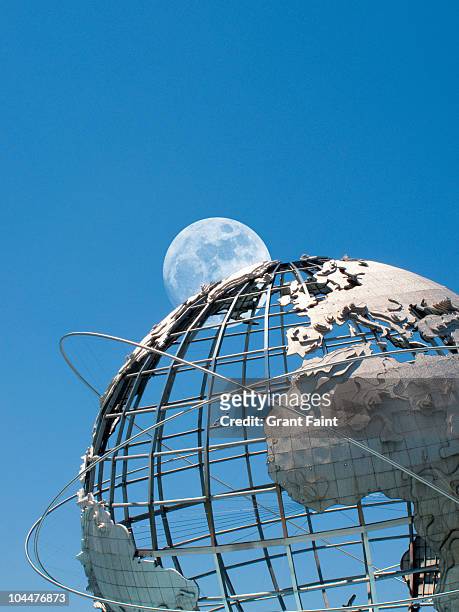 moonrise over huge globe. - unisphere bildbanksfoton och bilder