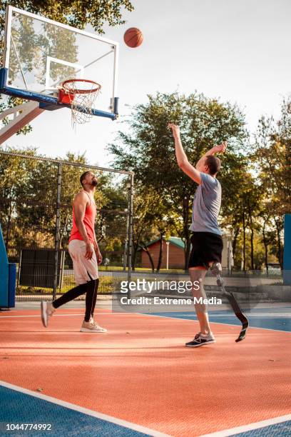 Friends playing basketball