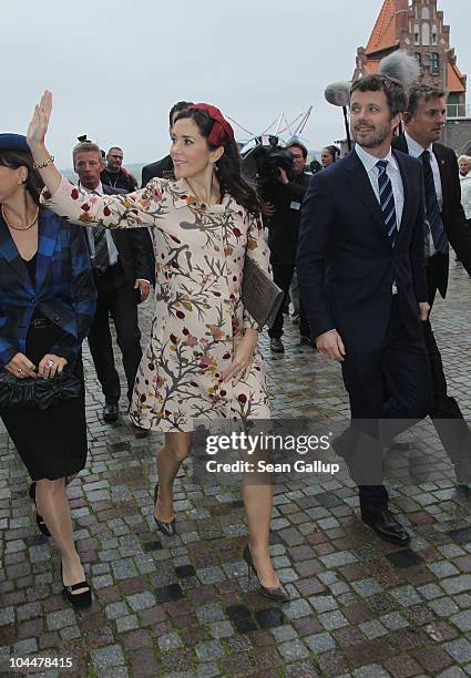 Danish Crown Prince Frederik and Crown Princess Mary, who is pregnant with twins, arrive at the Ozeaneum maritime museum and aquarium on September...