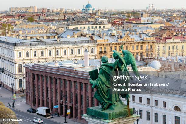 photograph with aerial view of st. petersburg and statue from colonnade of st. isaac cathedral, russia - san petersburgo fotografías e imágenes de stock