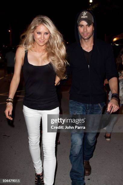 Anna Kournikova and Enrique Iglesias leave the Orange Carpet for the Miami Dolphins versus New York Jets game at Sun Life Stadium on September 26,...