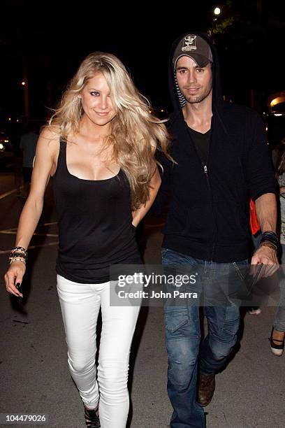 Anna Kournikova and Enrique Iglesias leave the Orange Carpet for the Miami Dolphins versus New York Jets game at Sun Life Stadium on September 26,...