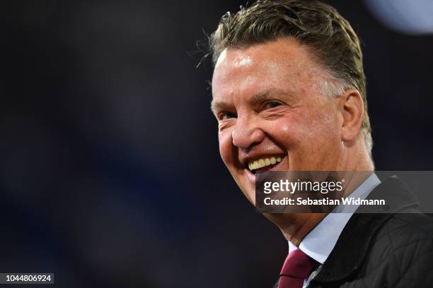 Louis van Gaal smiles prior to the Group E match of the UEFA Champions League between FC Bayern Muenchen and Ajax at Allianz Arena on October 2, 2018...