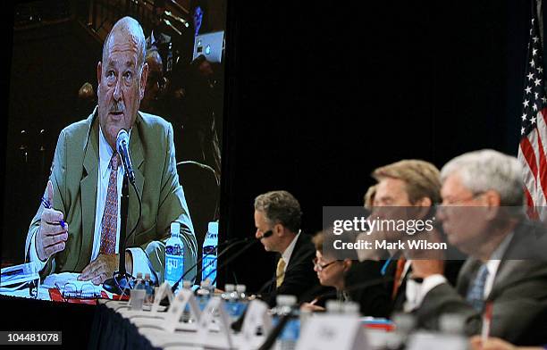 Members of the Oil Spill Commission listen to Retired Coast Guard Adm. Thad Allen, national incident commander for the Gulf oil spill, speak during a...