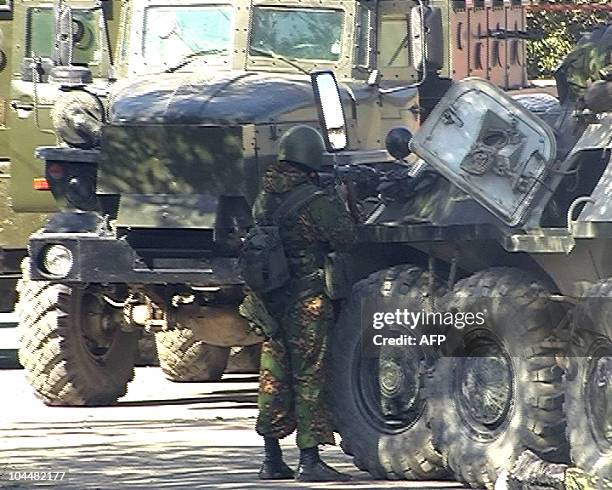 Grab released by News Team shows a Russian riot policemen during a police operation in the Dagestani capital Makhachkala on September 25, 2010. A...