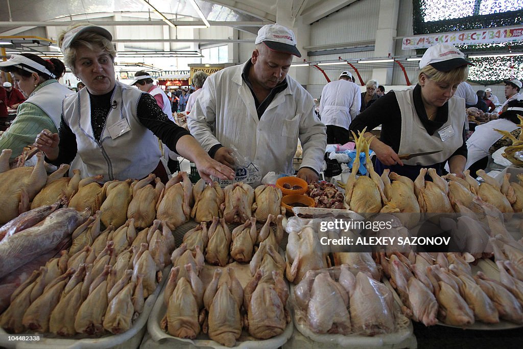 Butchers present their meat at the Dorog