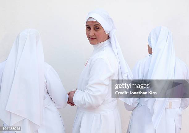 three "real" nuns in argentina.  - nun walking foto e immagini stock