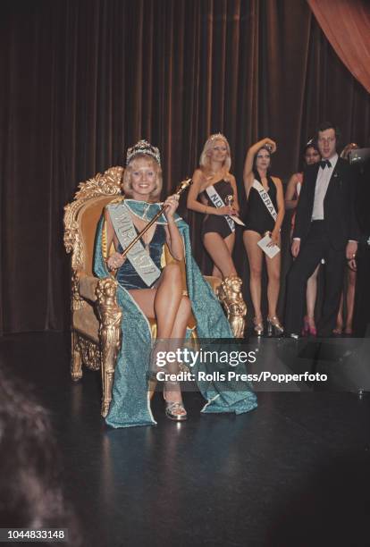 Winner of Miss World 1972 beauty pageant, Belinda Green of Australia wears her crown and sits on the winnner's throne at the Royal Albert Hall in...