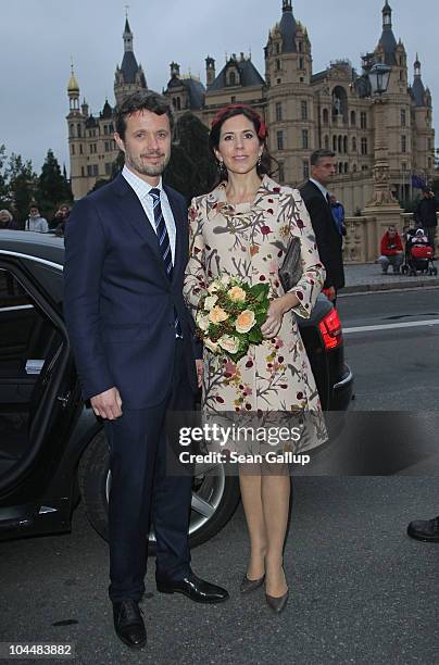 Danish Crown Prince Frederik and Danish Crown Princess Mary, who is pregnant with twins, stand outside Schloss Schwerin palace on September 27, 2010...