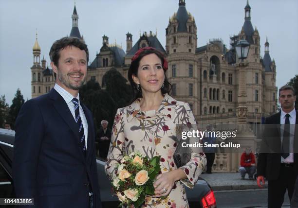 Danish Crown Prince Frederik and Danish Crown Princess Mary, who is pregnant with twins, stand outside Schloss Schwerin palace on September 27, 2010...