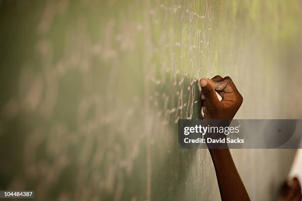 hand writing on chalkboard - brown v board of education stockfoto's en -beelden