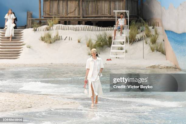 Model walks the runway during the Chanel show as part of the Paris Fashion Week Womenswear Spring/Summer 2019 on October 2, 2018 in Paris, France.