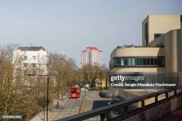 harrow road in london, england looking towards the parson's house building - harrow london stock pictures, royalty-free photos & images