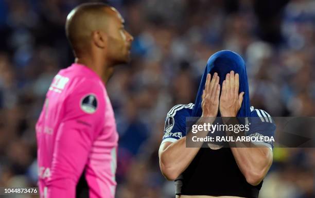 Colombia's Independiente Santa Fe goalkeeper Robinson Zapata celebrates with his teammates at the end of their Copa Sudamericana football match...