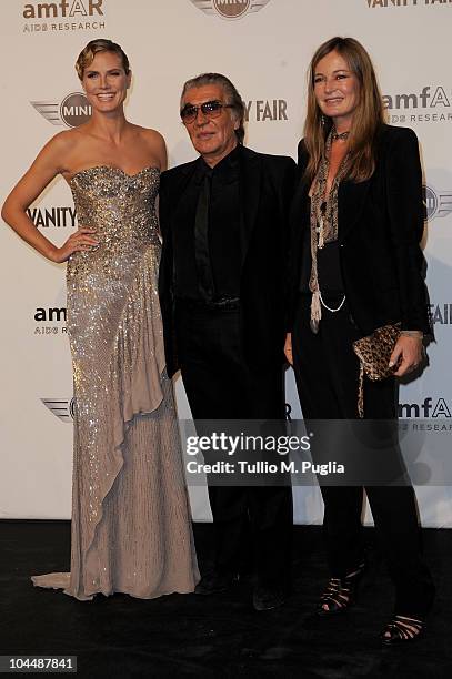 Heidi Klum, Roberto and Eva Cavalli attend amfAR Milano 2010 Red Carpet during Milan Fashion Week Womenswear Spring/Summer 2011 at La Permanente on...