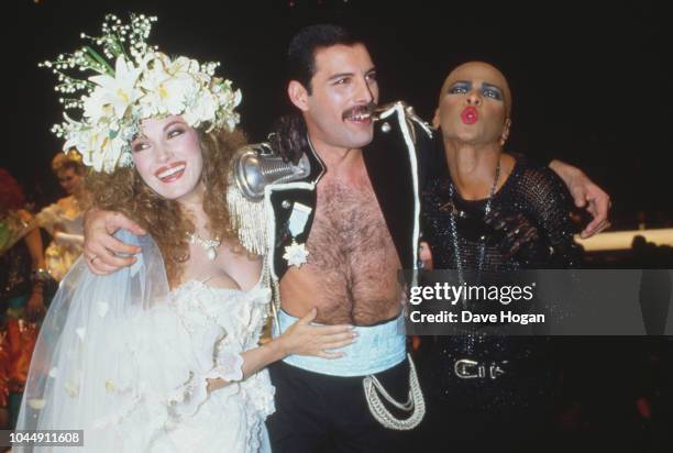 Singer Freddie Mercury of British rock group Queen, with English actress Jane Seymour during the Fashion Aid benefit concert for Ethiopian famine...