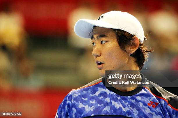 Yoshihito Nishioka of Japan plays a looks on in the Singles first round against Nick Kyrgios of Australia on day three of the Rakuten Open at...