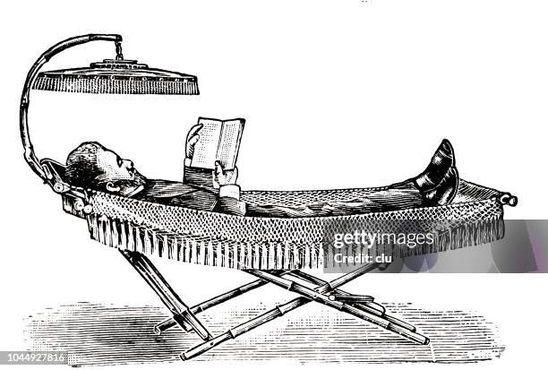 man lying on camping bed, reading a book with a sun shade above - archival camping stock illustrations