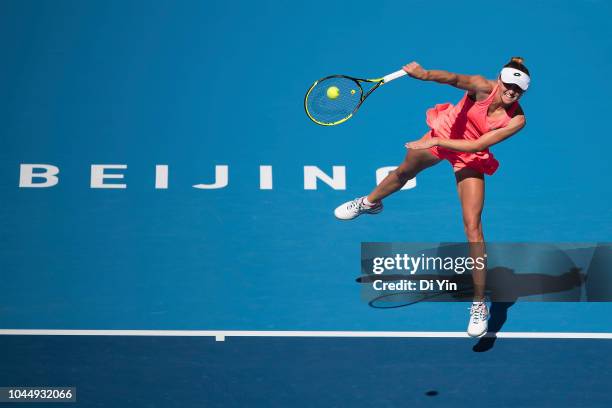 Aliaksandra Sasnovich of Belarus serves to Karolina Pliskova of the Czech Republic during her women's singles second round match at the China...