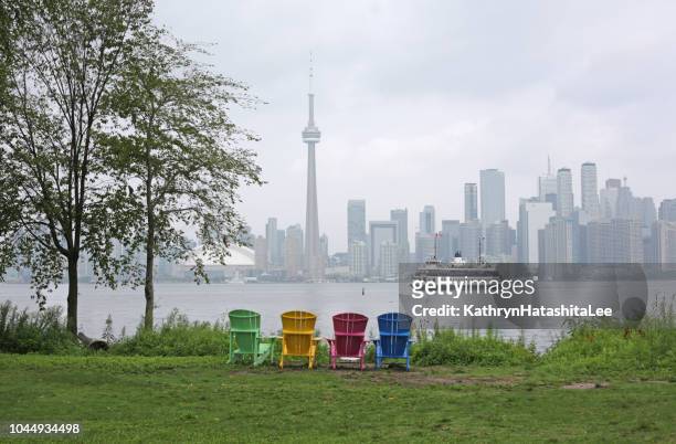 toronto skyline and  inner harbour in summer fog - toronto islands stock pictures, royalty-free photos & images