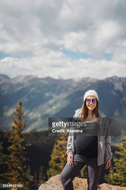 pregnant woman enjoying the view in aspen, colorado - european best pictures of the day september 26 2017 stock pictures, royalty-free photos & images