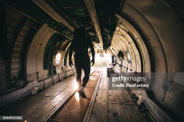 parachuter preparing for a parachute jump - dare devil stock pictures, royalty-free photos & images