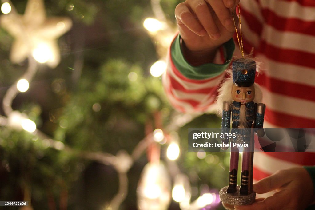 Close up of hands holding nutcracker