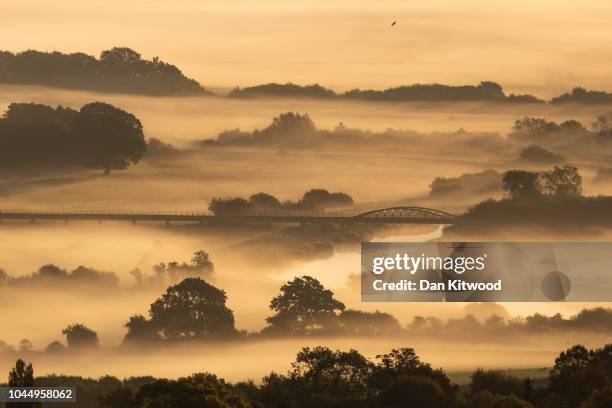 Mist hangs in the Valley near Amberley in the South Downs National Park on October 3, 2018 in Amberly, United Kingdom.