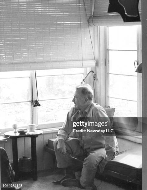 On November 5 John Steinbeck admires the view from the sun porch of his Sag Harbor, New York home -a favorite spot of his as he overlooks Sag Harbor...