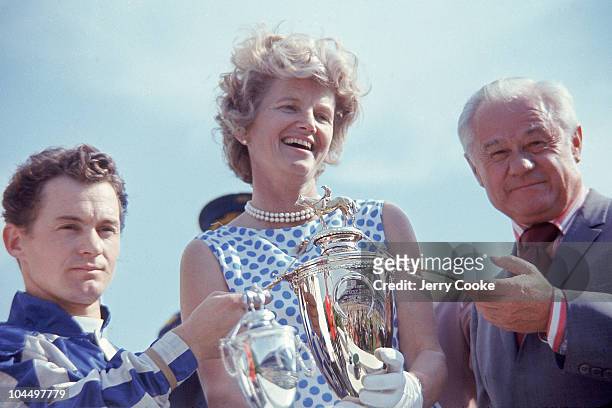 Kentucky Derby: Riva Ridge jockey Ron Turcotte, owner Helen "Penny" Chenery Tweedy, and trainer Lucien Laurin victorious with trophy after winning...