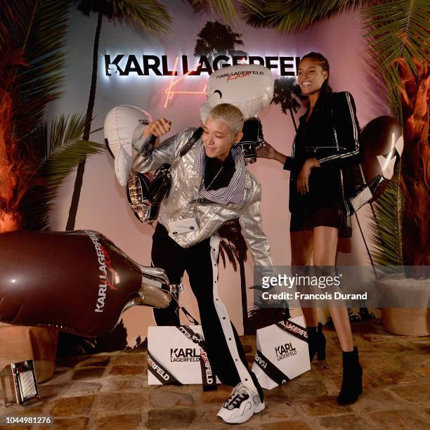 Dilone and Cindy Bruna celebrate the launch of the Karl x Kaia collaboration capsule collection, on October 2, 2018 in Paris, France.