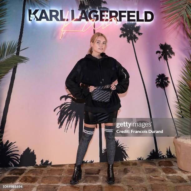 Guest celebrates the launch of the Karl x Kaia collaboration capsule collection, on October 2, 2018 in Paris, France.