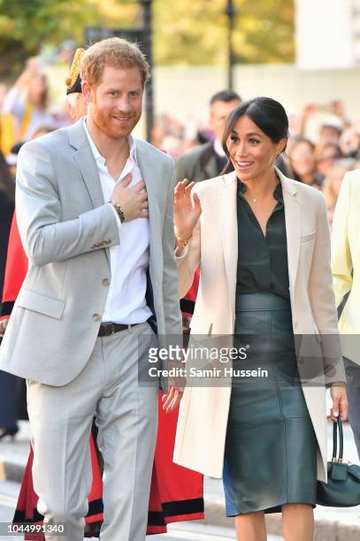 Prince Harry, Duke of Sussex and Meghan, Duchess of Sussex arrive at Edes House in Chichester during an official visit to Sussex on October 3, 2018...