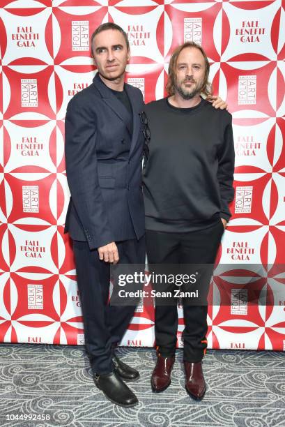 Raf Simons and Sterling Ruby attend the American Folk Art Museum Fall Benefit Gala 2018 at The Ziegfeld Ballroom on October 2, 2018 in New York City.