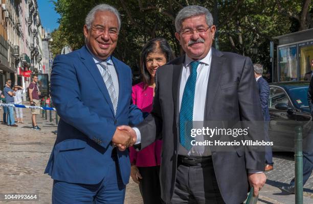 Portugal's Prime Minister Antonio Costa greets the Prime Minister of Algeria Ahmed Ouyahia upon his arrival in Palacio Foz to participate in the...