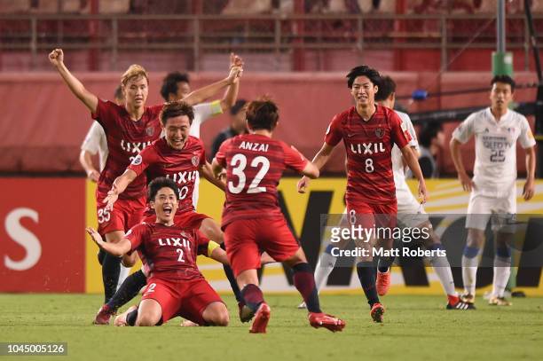 Atsuto Uchida of Kashima Antlers celebrates scoring the winning goal during the AFC Champions League semi final first leg match between Kashima...