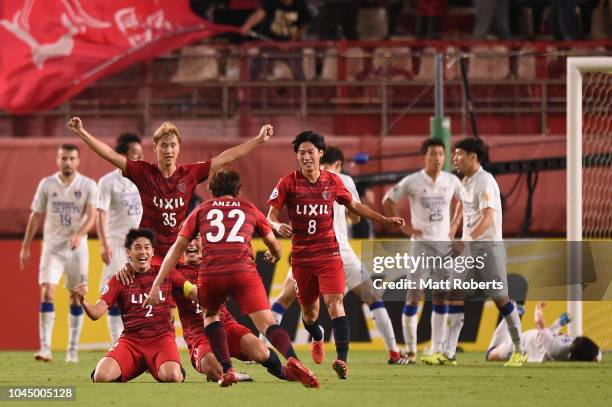 Atsuto Uchida of Kashima Antlers celebrates scoring the winning goal during the AFC Champions League semi final first leg match between Kashima...