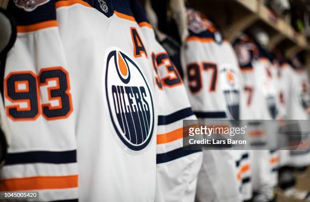 Edmonton Oilers uniforms hang in the locker room prior to the NHL Global Series Challenge game between Edmonton Oilers and Kolner Haie at Lanxess...