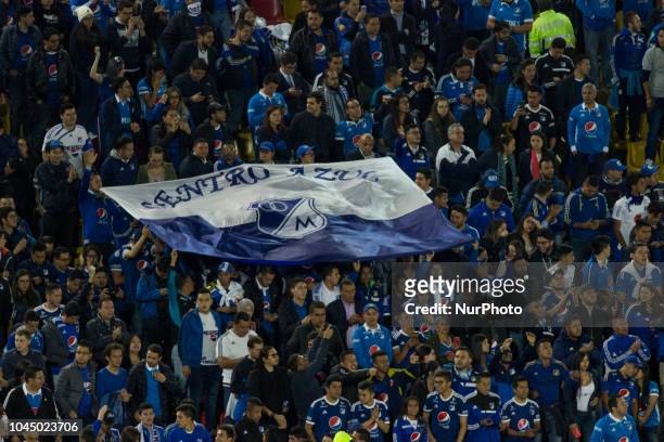 The fans of Millionarios with a flag alluding to the team during Copa Sudamericana match between Millonarios and Independiente Santa Fe at Estadio...