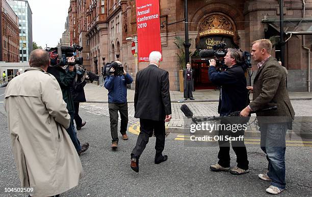 Shadow Chancellor of the Exchequer Alistair Darling is pursued by the media on the third day of the Labour party conference at Manchester Central on...