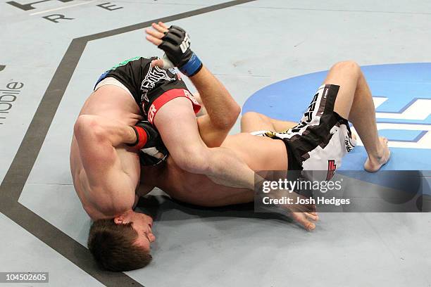 Joe Doerksen and CB Dollaway wrestle during their UFC middleweight bout at Conseco Fieldhouse on September 25, 2010 in Indianapolis, Indiana.