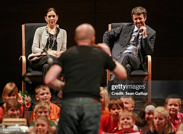 Danish Crown Prince Frederik and Danish Crown Princess Mary, who is pregnant with twins, watch Danish percussion artist Thomas Sandberg perform for...
