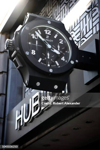 Giant replica of a Hublot wristwatch tells the time outside a Hublot watch store in San Francisco, California. Hublot is a Swiss luxury watchmaker...