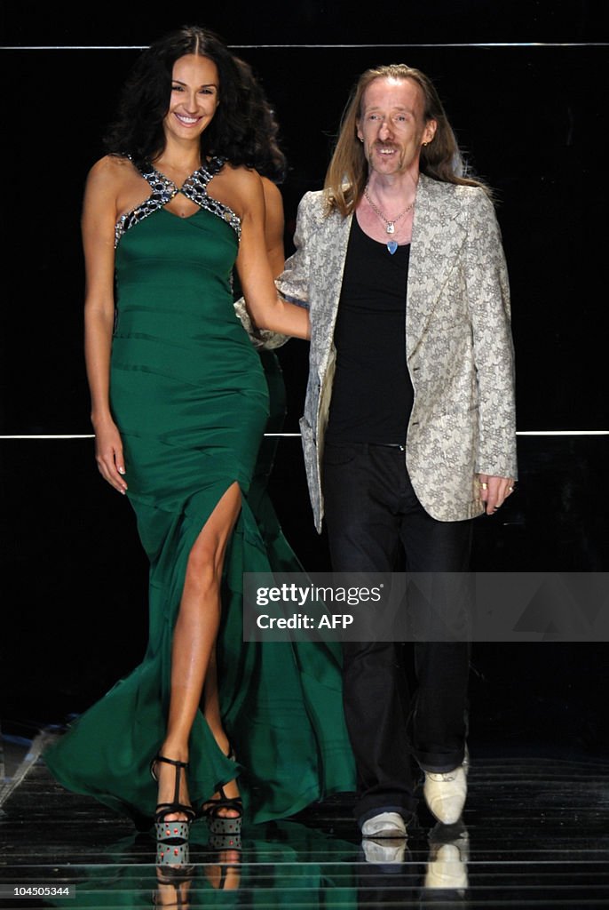 John Ricmo Fashion designer John Richmond acknowledges the audience at the end ...