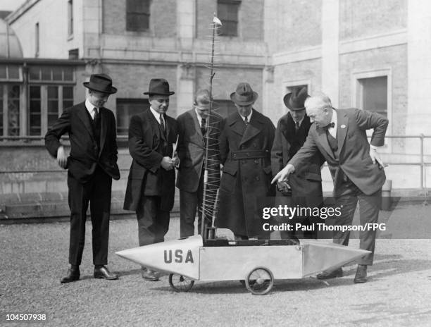 Inventor Edwin Slavin at the Radio Show in Pennsylvania with his invention, the wireless controlled torpedo car, circa 1940s.