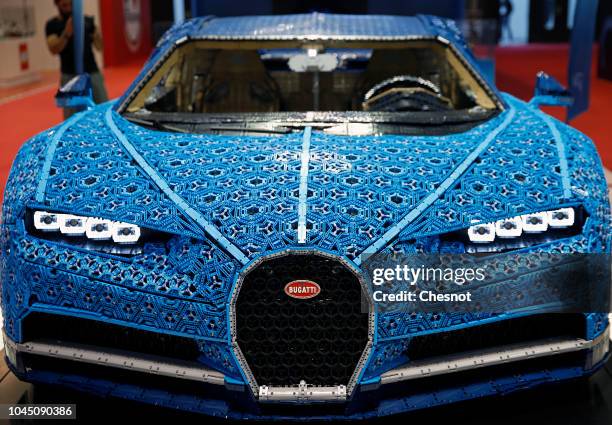 Bugatti Chiron automobile made with LEGO blocks is on display during the second press day of the Paris Motor Show at the Parc des Expositions at the...