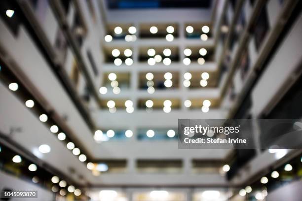 Soft-focus view of an art centre's interior courtyard in Hong Kong. The Jockey Club Creative Arts Centre was formally a disused factory buidling,...