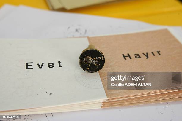 "Yes" and "No" ballots are seen at a polling station in Ankara on September 12, 2010 during a referendum on constitutional changes. Turks voted on...